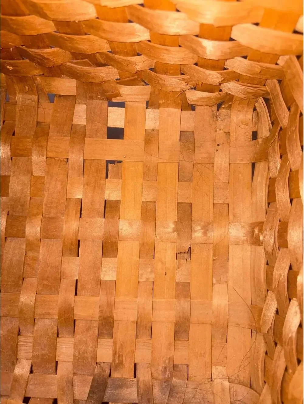 Vintage hand-woven wooden stair-step basket with curly splint decorations